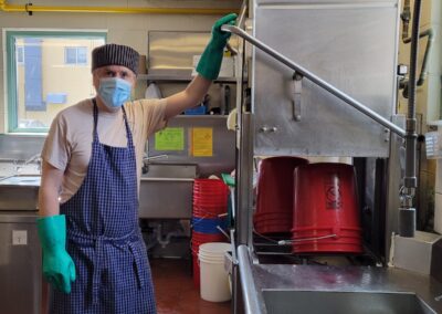 Volunteer Michael dish washing