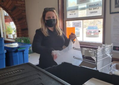 Volunteer on takeout window duty 2022